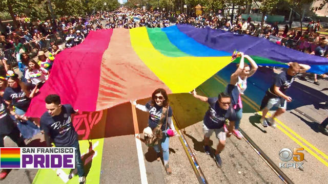 pride-flag_marchers.jpg 