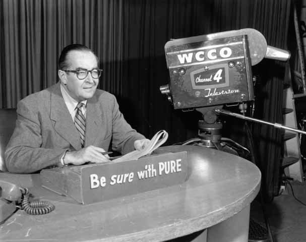 Cedric Adams reading the news 