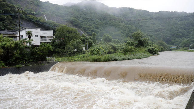 The Futami River is swollen due to heavy rain in Yatsushiro, Kumamoto Prefecture, southwestern Japan 