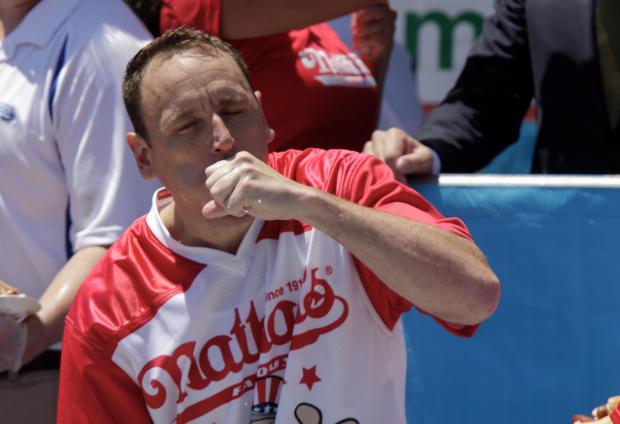Joey Chestnut eats during the Nathan's Famous Fourth of July hot dog eating contest on July 4, 2019, in New York City. 