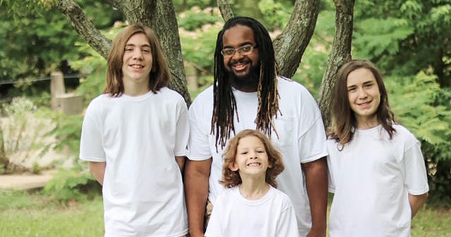 Man once in foster care becomes foster parent at 20 and adopts three ...