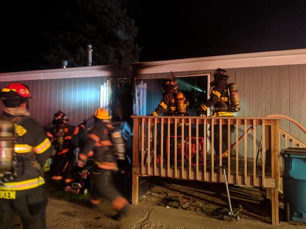 dog saves owner from mobile home fire 4 - berthoud fire 