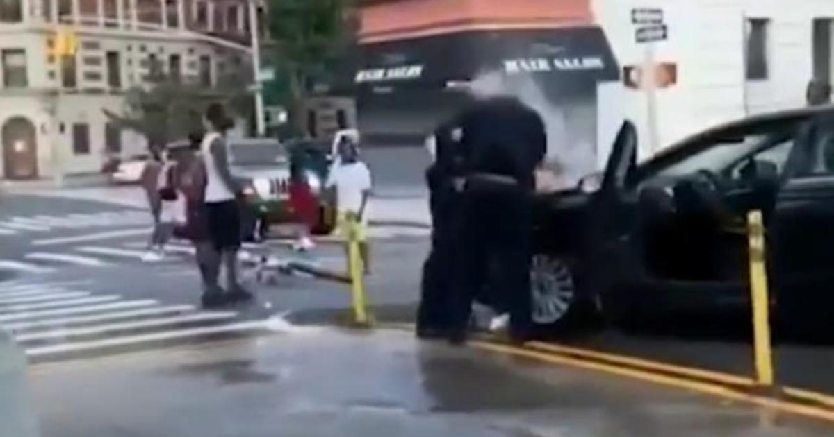 Videos Show Nypd Officers Being Doused With Water Cbs News 