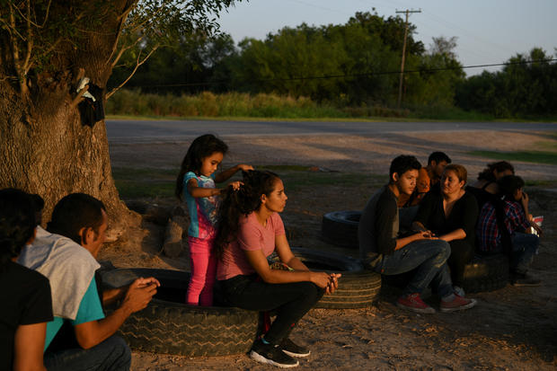 Central American asylum seekers turn themselves in to U.S. Border Patrol after illegally crossing the Rio Grande in Los Ebanos 