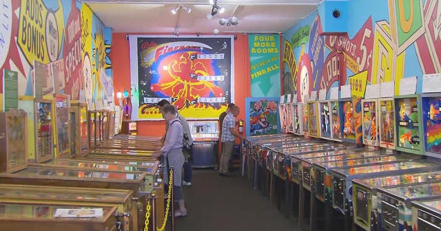 Flipping over a pinball machine museum - CBS News