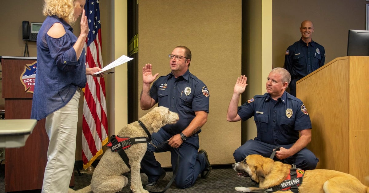 Two Dogs Sworn In As South Metro Fire Emergency Responder Service Dogs