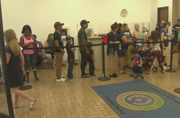Families wait to get their children vaccinated in Dallas County 
