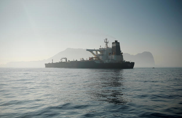 FILE PHOTO: Iranian oil tanker Grace 1 sits anchored after it was seized in July by British Royal Marines off the coast of the British Mediterranean territory, in the Strait of Gibraltar 