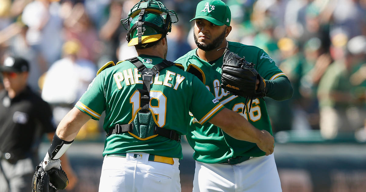 Chapman, Canha back Bassitt in A's 8-4 win over Astros