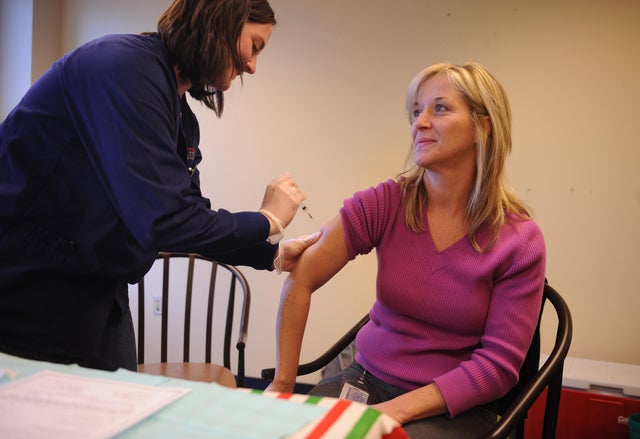 Kate Carpenter Administers Measels Vaccines To Annie Barker 
