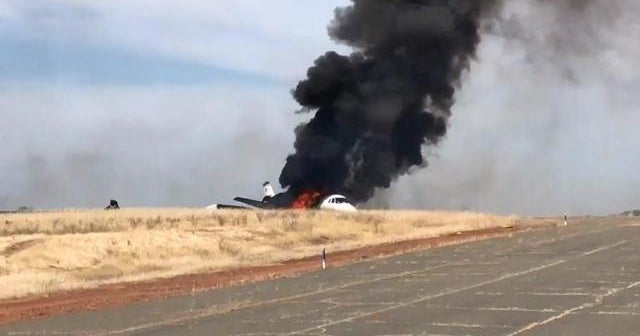 All 10 passengers survive after plane skids off runway, bursts into