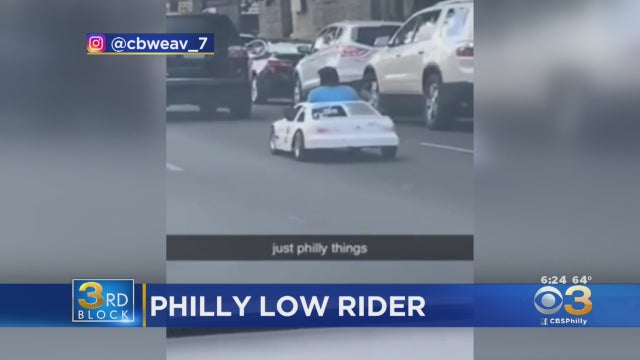 Man-Spotted-Driving-Childs-Electric-Car-Down-Broad-Street.jpg 