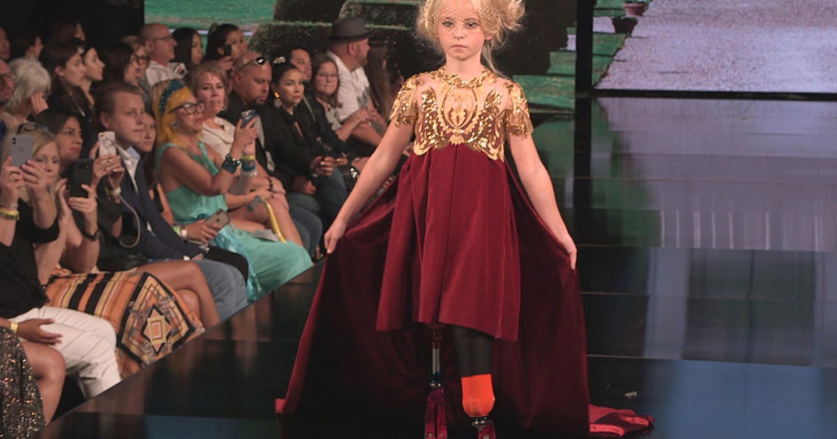 NYFW 9 year old double amputee Daisy May Demetre walks the Lulu et Gigi runway at New York Fashion Week CBS News