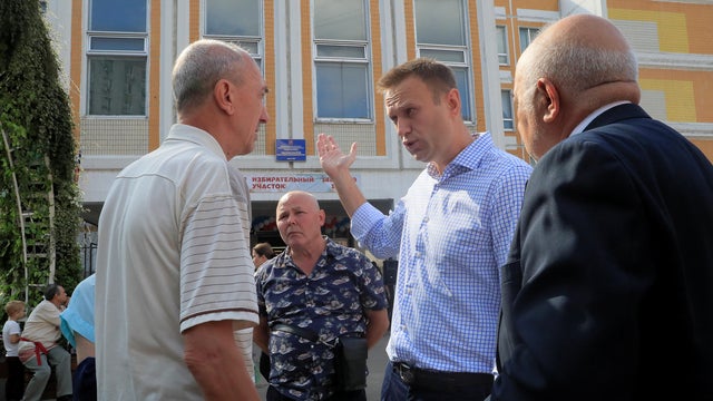 Russian opposition leader Navalny visits a polling station during a local election in Moscow 