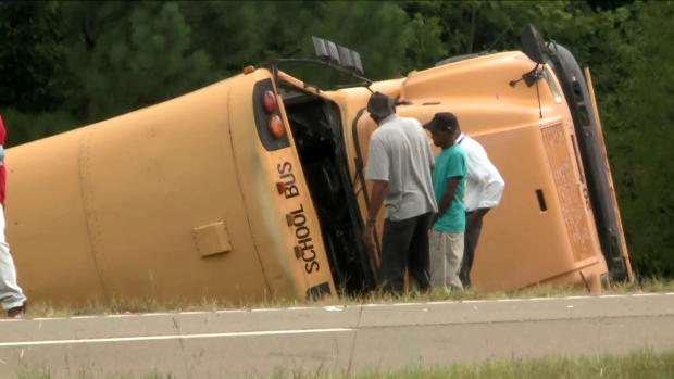 Crews work the scene of a deadly school bus crash in Benton County, Mississippi, on September, 10, 2019. 