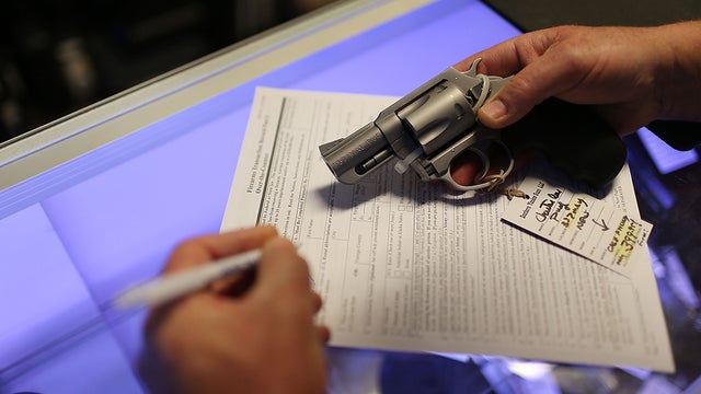 guns-background-check.jpg 