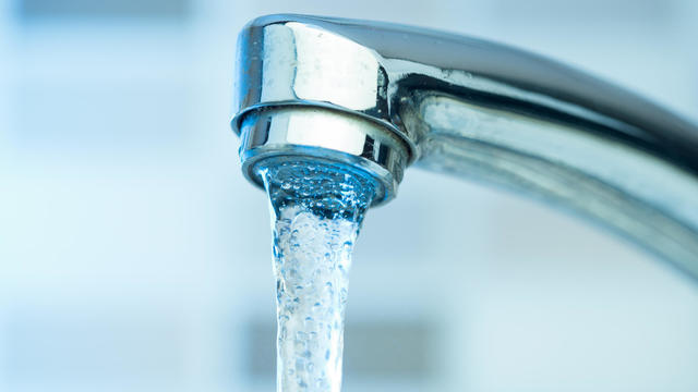 Pouring water from a Faucet 