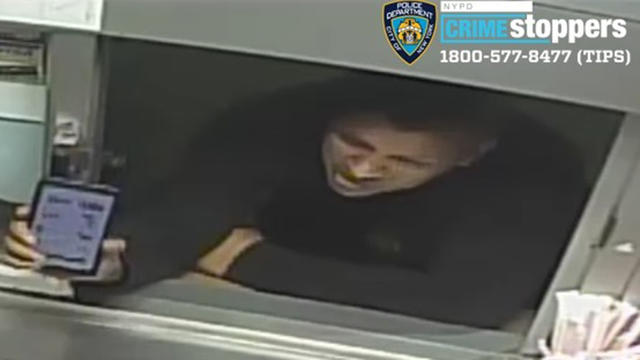 Cyclist-smashes-Burger-King-window-NYPD.jpg 