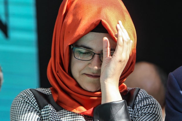 Hatice Cengiz, fiancee of murdered Saudi journalist Jamal Khashoggi, cries during a ceremony near Saudi Arabia's consulate in Istanbul, Turkey, marking the one-year anniversary of Khashoggi's death on October 2, 2019.