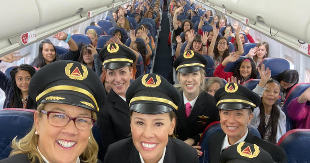 All-women Delta crew flies 120 girls to NASA to encourage female aviators - CBS News
