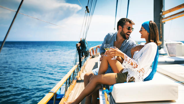 Couple on a sailboat. 