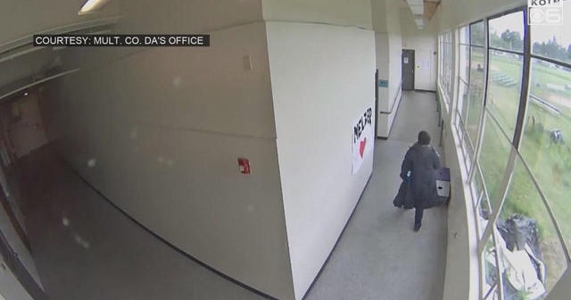 Surveillance video captures dramatic moment football coach disarmed