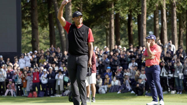 Tiger Woods celebrates to win the final round of the Zozo Championship, a PGA Tour event, at Narashino Country Club in Inzai, Japan 