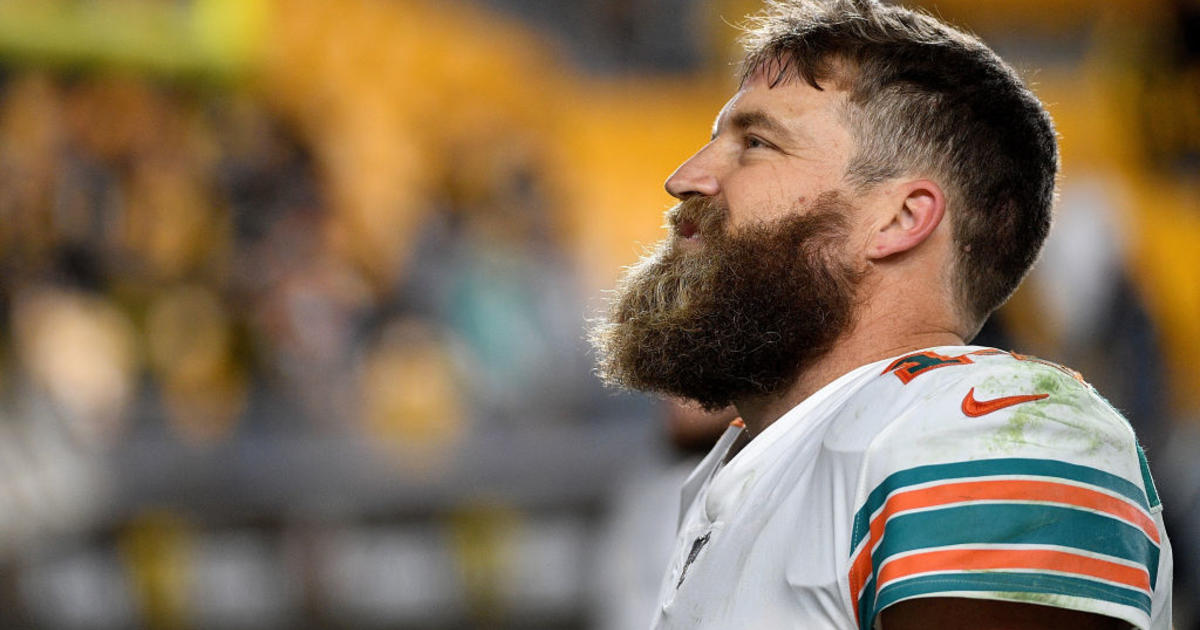 Ryan Fitzpatrick of the Miami Dolphins warms up prior to the game