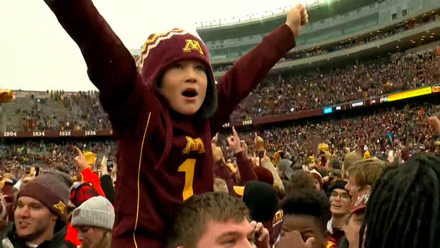 Kid Celebrates On Field After Gophers Beat Penn State 