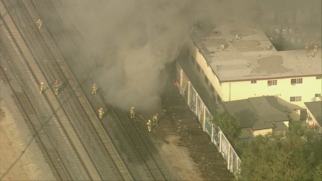 Fire Breaks Out In Stack Of Wooden Railroad Ties In Commerce