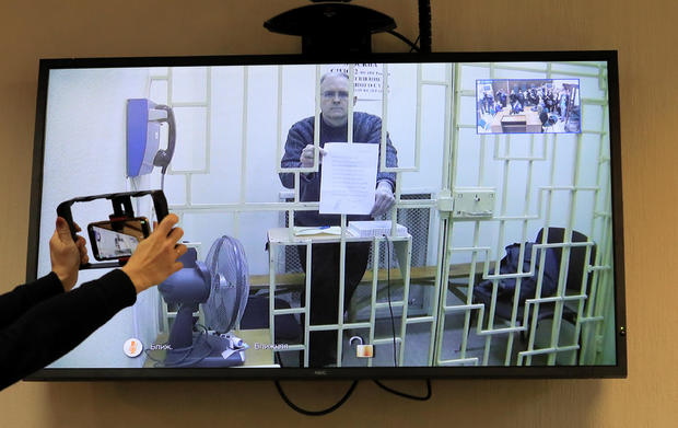 Former U.S. marine Whelan is seen on a screen via a video link during a court hearing in Moscow 