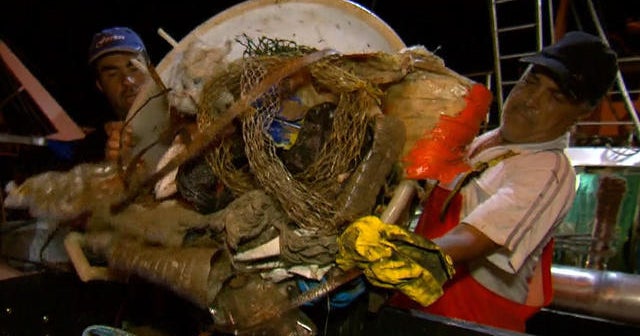 Fishermen join a "fishing for plastic" project to help clean the oceans