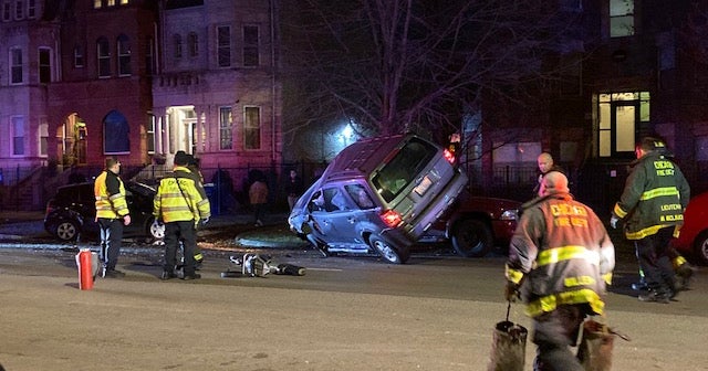 Van Crashes, Ends Up On Top Of Parked Car On South Michigan Avenue ...
