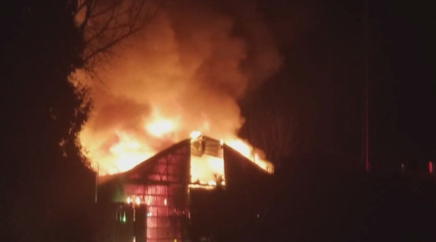 A barn burns at an Ohio wildlife park November 28, 2019. 