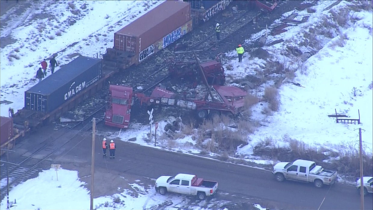 Semi Crashes, Freight Train Derails On Highway 85 In Weld County CBS(01)