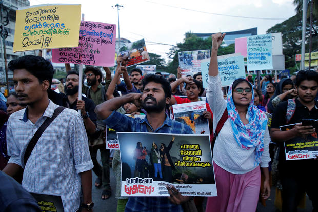 Demonstrators shout slogans during a protest march to show solidarity with the students of New Delhi's Jamia Millia Islamia university, in Kochi 