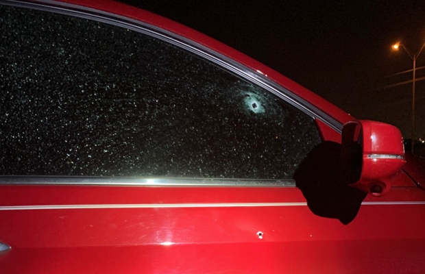 Bullet holes in car 