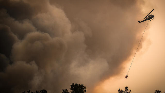 Firefighters Continue To Battle Bushfires As Catastrophic Fire Danger Warning Is Issued In NSW 