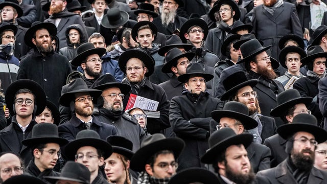 Orthodox Jews take part in the 13th Siyum HaShas, a celebration marking the completion of the Daf Yomi, a seven-and-a-half-year cycle of studying texts from the Talmud, the canon of Jewish religious law, at MetLife Stadium in East Rutherford, New Jersey, January 1, 2020. 