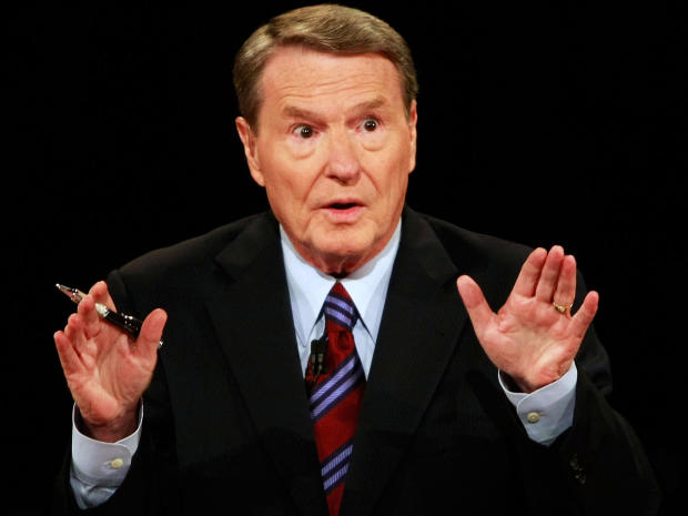 Veteran PBS anchor and debate moderator Jim Lehrer asks a question during the first presidential debate between Senator John McCain and Senator Barack Obama at the University of Mississippi in Oxford, Mississippi, on September 26, 2008. 