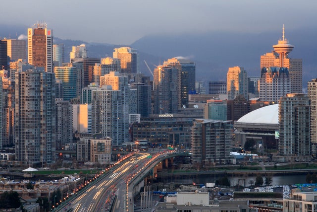 Canada British Columbia Vancouver - Vancouver Downtown, Cambie Bridge, BC Place Stadium (Celebration Place for 2010 Winter Olympics), Harbour Centre, Scotia Tower, False Creek in the evening. 