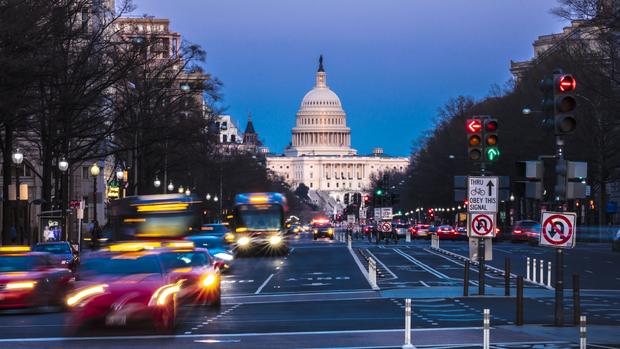 Pennsylvania Ave to US Capitol with Streaked lights during evening rush hour 