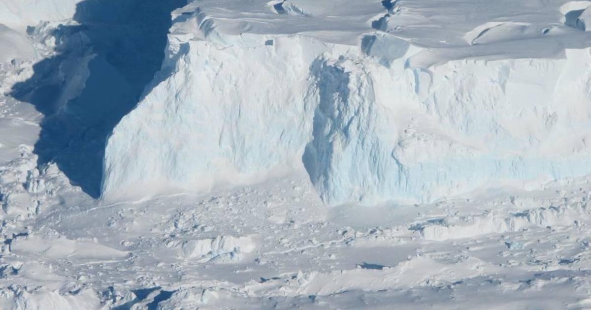 Antarctica’s Thwaites Glacier collapse could raise sea levels by 10 feet and is “holding on today by its fingernails” scientists say – CBS News