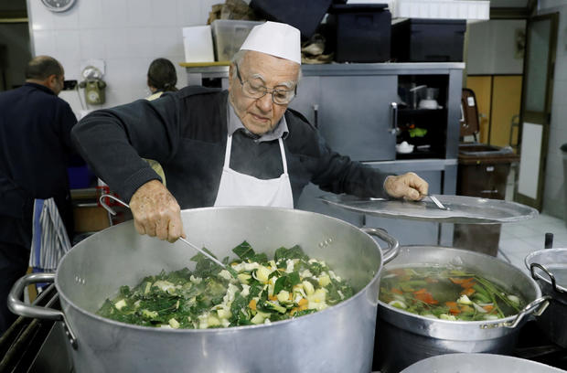 Dino Impagliazzo, Rome's 90-year-old 'chef of the poor', prepares food for the homeless 