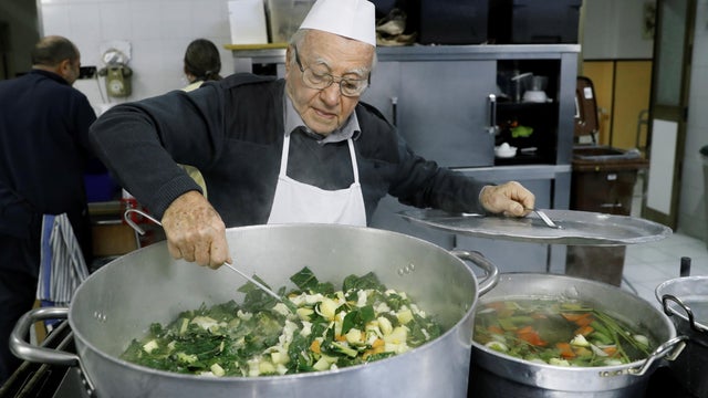 Dino Impagliazzo, Rome's 90-year-old 'chef of the poor', prepares food for the homeless 