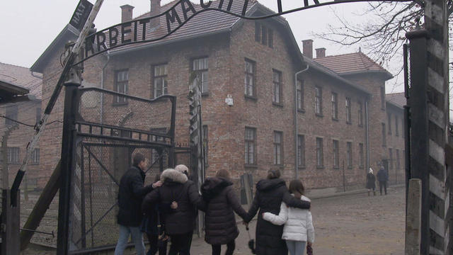 michael-bornstein-and-family-pass-through-gate-at-auschwitz-promo.jpg 