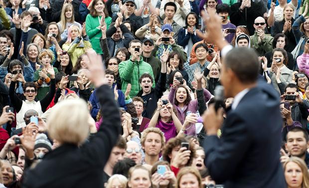 The crowd cheers as US President Barack 