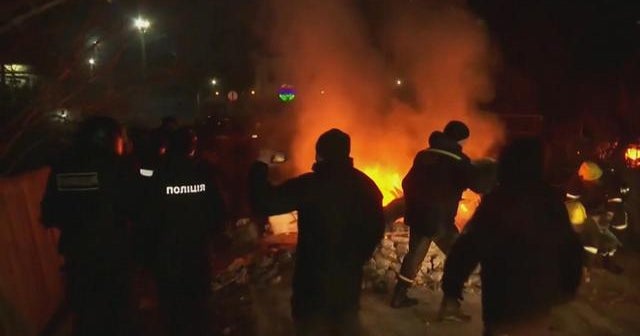 Ukraine protesters throw rocks at bus carrying coronavirus evacuees ...