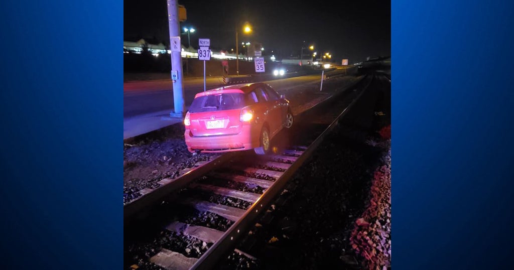 Police In Duquesne Help Driver That Got Car Stuck On Train Tracks CBS