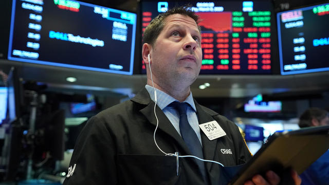 Traders work on the floor of the New York Stock Exchange 